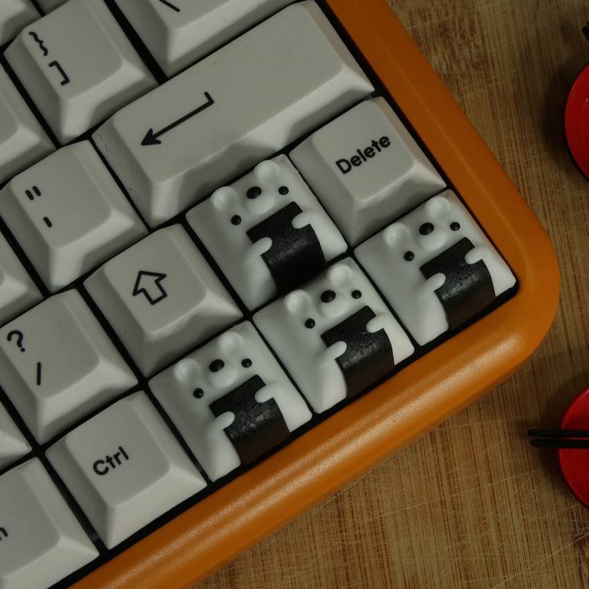 A keyboard fitted with Klaykaps handmade artisan keycaps